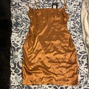A copper mini dress. Never worn